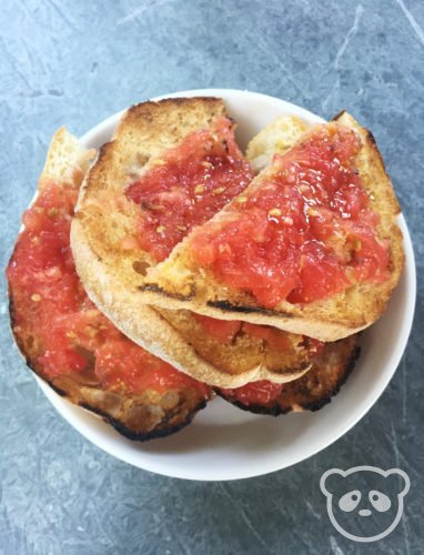Tomatoes on toast, a Spanish dish. 