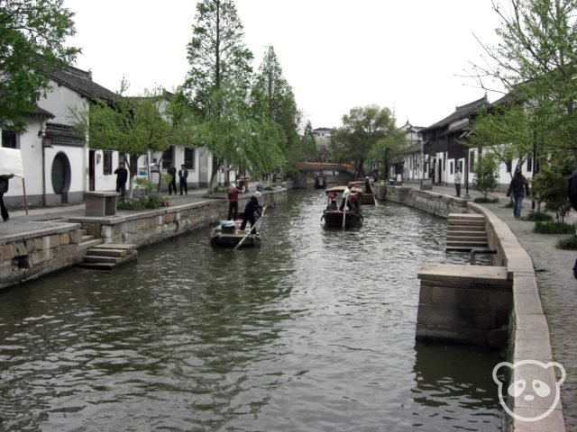 Canal boats along a canal in Zhujiajiao