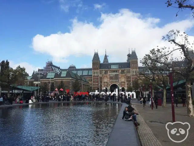 Rijksmuseum with IAmsterdam sign in the background