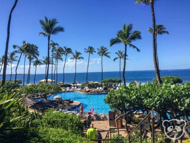 The pool at Hyatt Regency Maui with the Pacific Ocean behind it. 